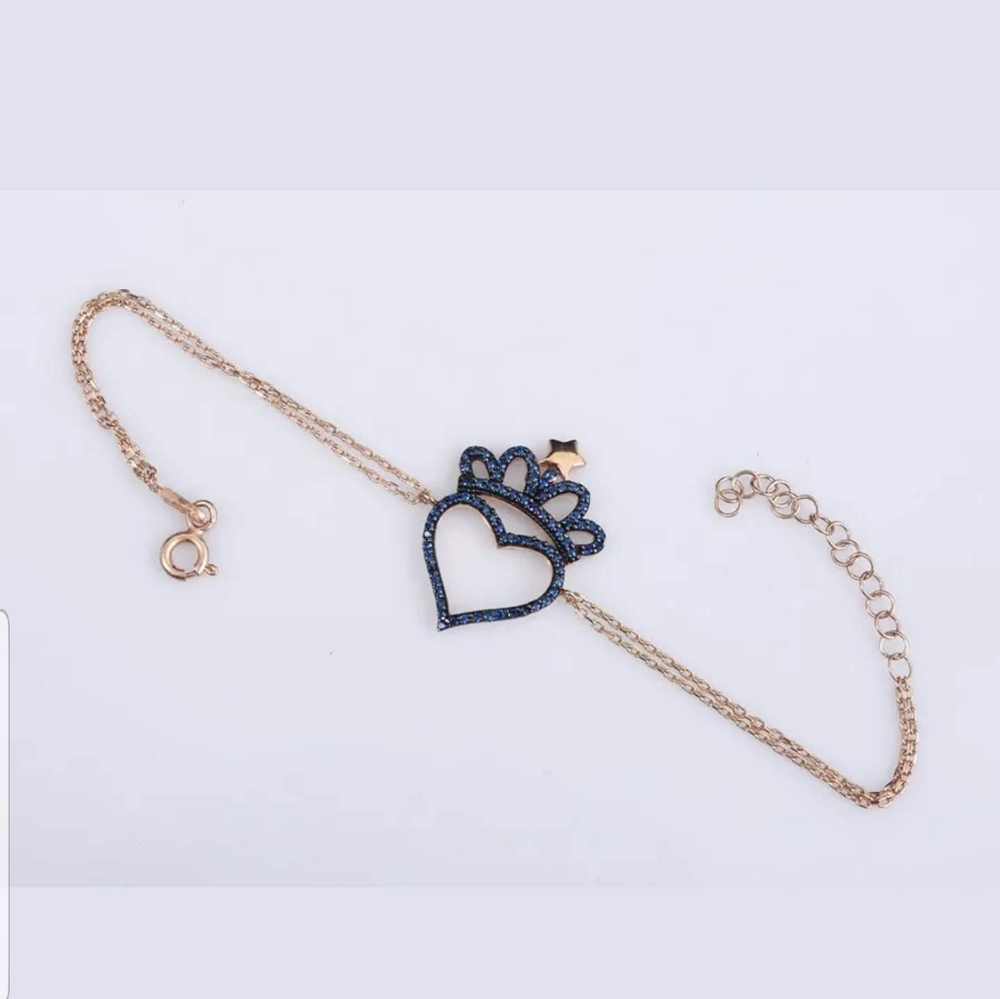 Sapphire heart wearing a crown rose gold bracelet
